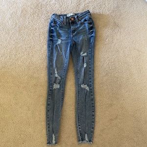 Mudd FLX Stretch Mid Rise Vintage Rip Skinny Jeans